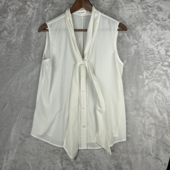 Calvin Klein Tops - Calvin Klein Cream Sleeveless Blouse Tie‎ Neck Button Front Top